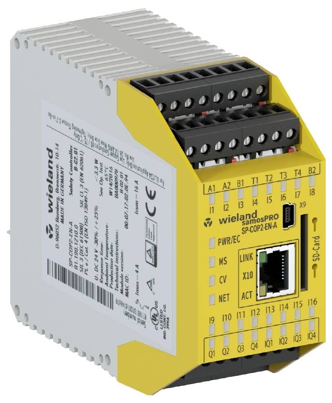 Module de sécurité électronique avec boîtier jaune et plusieurs connexions enfichables. La marque 'Wieland Electric' est visible.