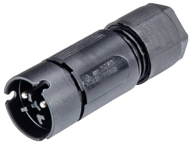 Connecteur électronique noir de forme circulaire avec trois contacts métalliques, couramment utilisé dans les appareils électriques.