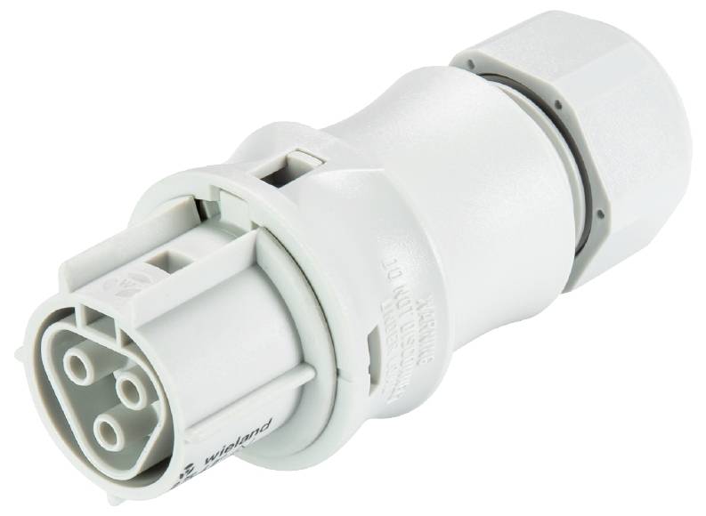 Un adaptateur électrique blanc multiprises, adapté à des applications de câblage spécifiques.