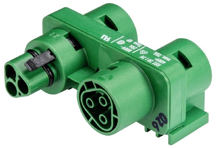 Connecteur électrique vert à trois broches et plusieurs connexions, adapté aux applications industrielles ou techniques.