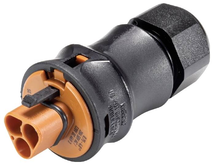 Un connecteur électronique noir et orange, de forme cylindrique, doté d'un mécanisme de verrouillage, conçu pour relier des câbles.