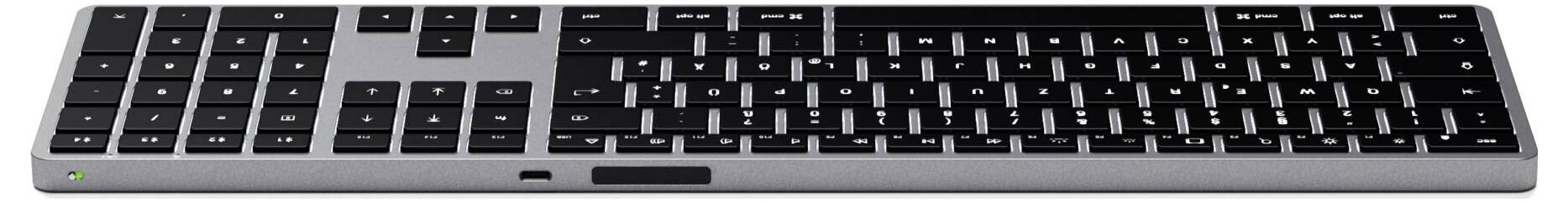 Un clavier d'ordinateur noir et élégant avec pavé numérique, posé sur un fond gris. Il offre une fonctionnalité sans fil.