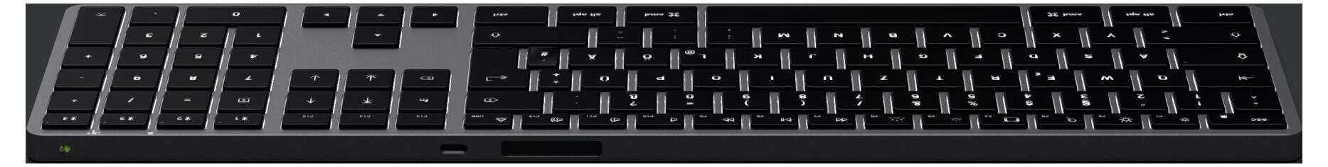 Un clavier d'ordinateur noir au design plat, avec une disposition complète des touches et un boîtier noir.