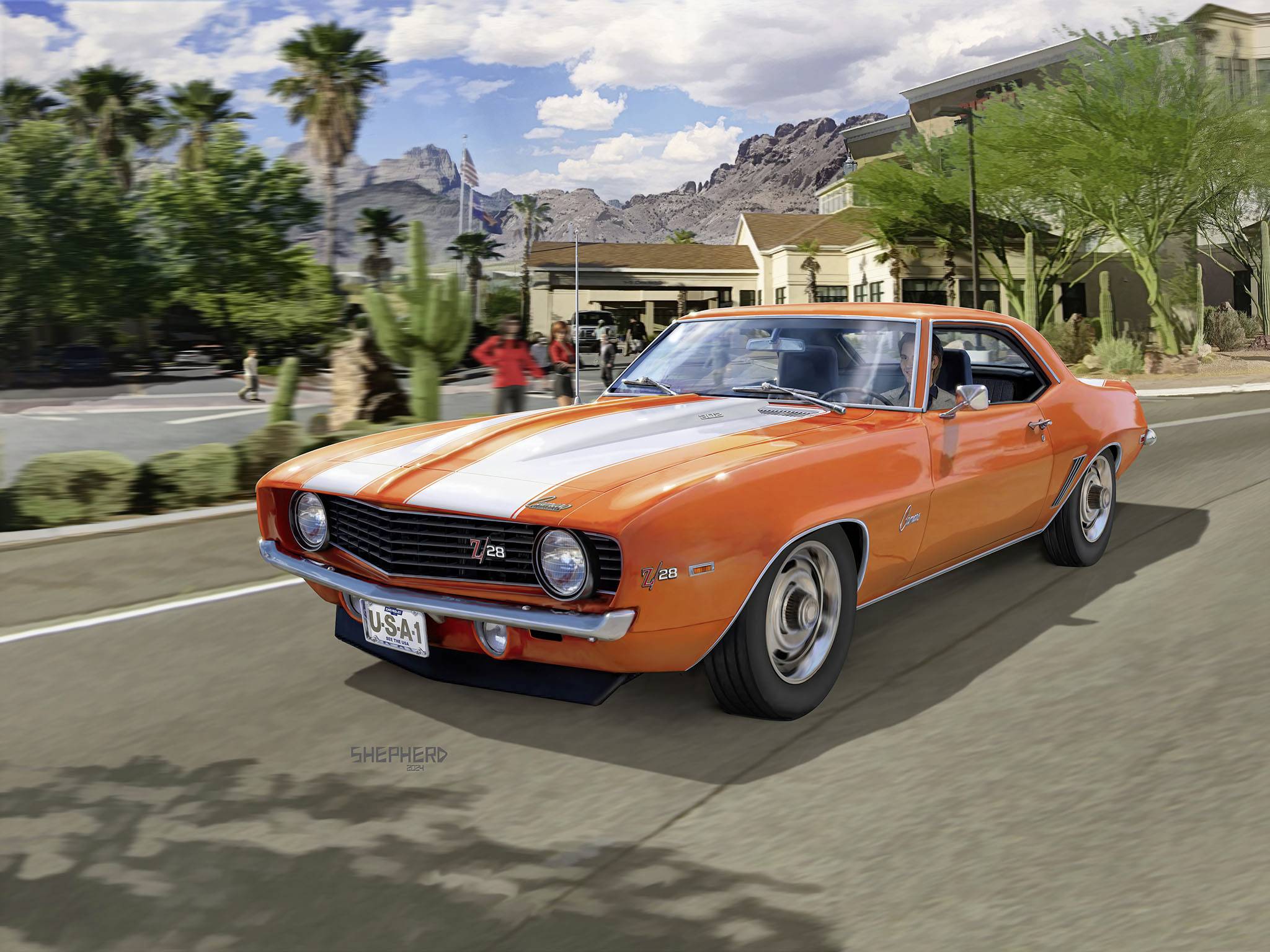 Une voiture ancienne orange et blanche roule sur une route dans un paysage désertique, avec des montagnes et des palmiers en arrière-plan, par temps ensoleillé.