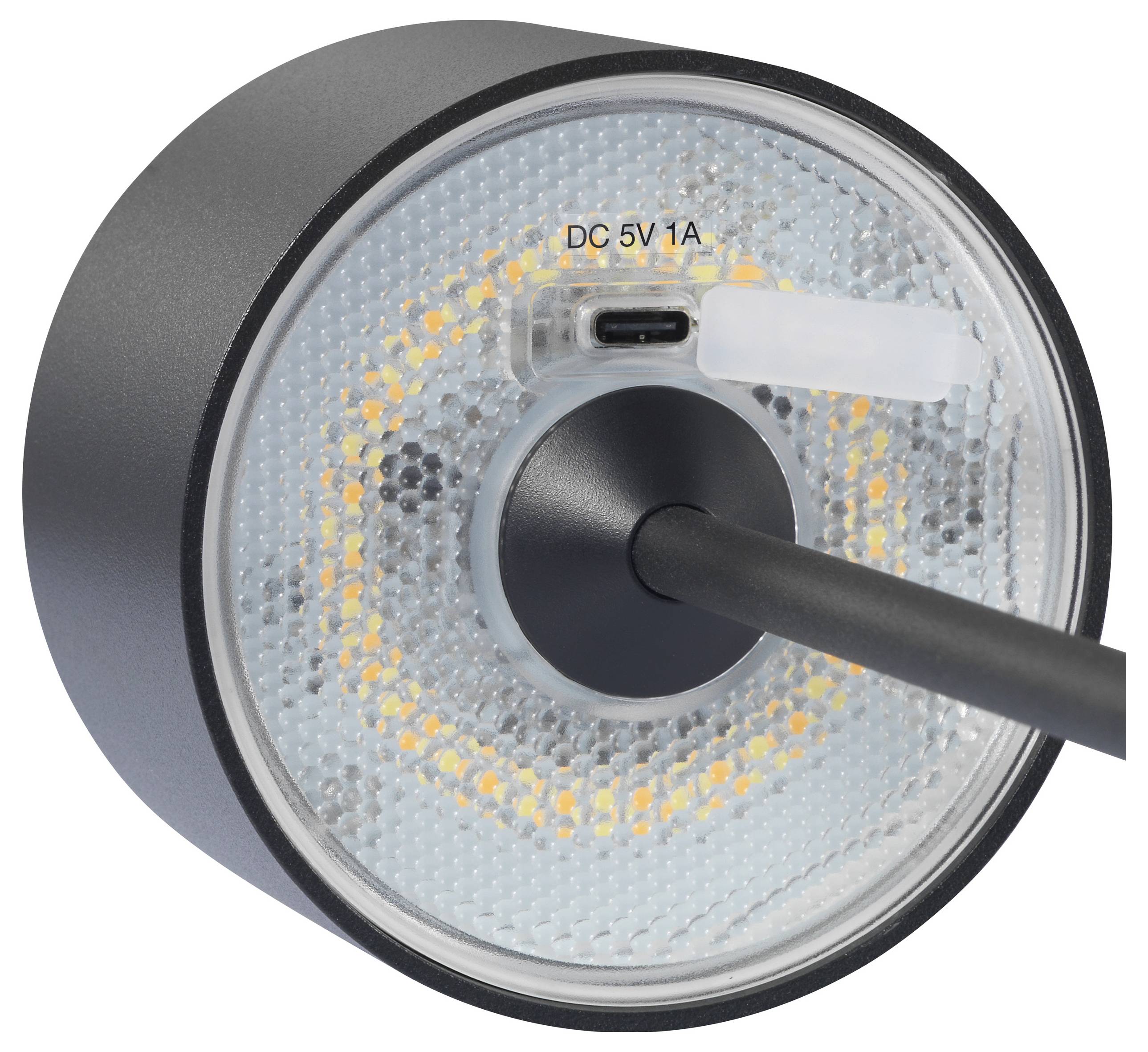 Gros plan d'un projecteur LED rond lumineux avec un câble noir et une prise d'alimentation portant l'inscription « DC 5V 1A » à l'intérieur.