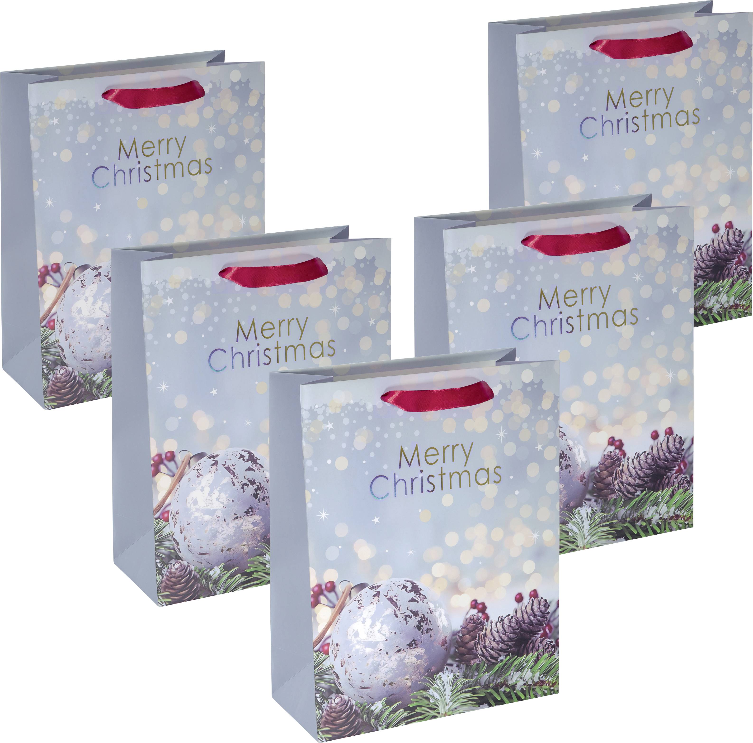 Cinq sacs-cadeaux portant l'inscription 'Merry Christmas', décorés de boules de Noël et de branches de sapin sur un fond bleu clair.