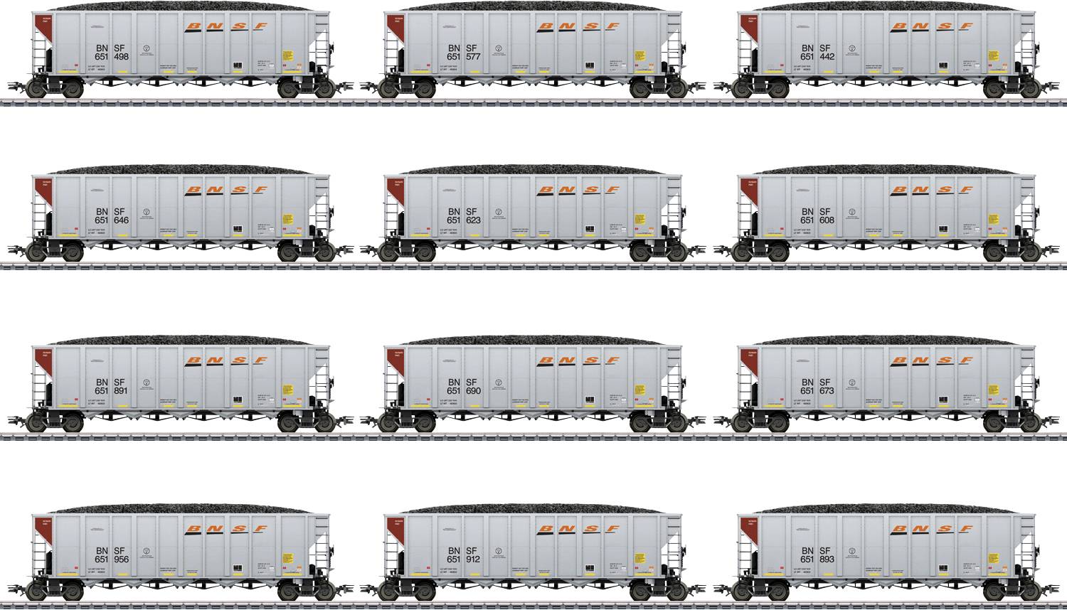Douze wagons de marchandises gris sur des rails, disposés en deux rangées. Chaque wagon porte des marquages et des numérotations similaires.