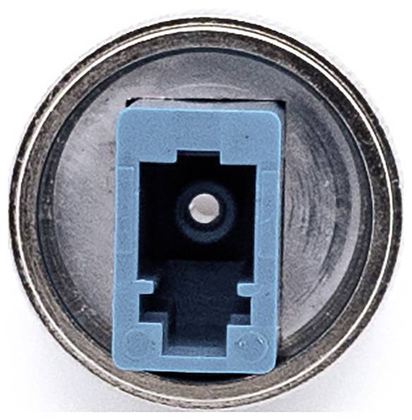 Un connecteur bleu dans un boîtier métallique rond, photographié du dessus.