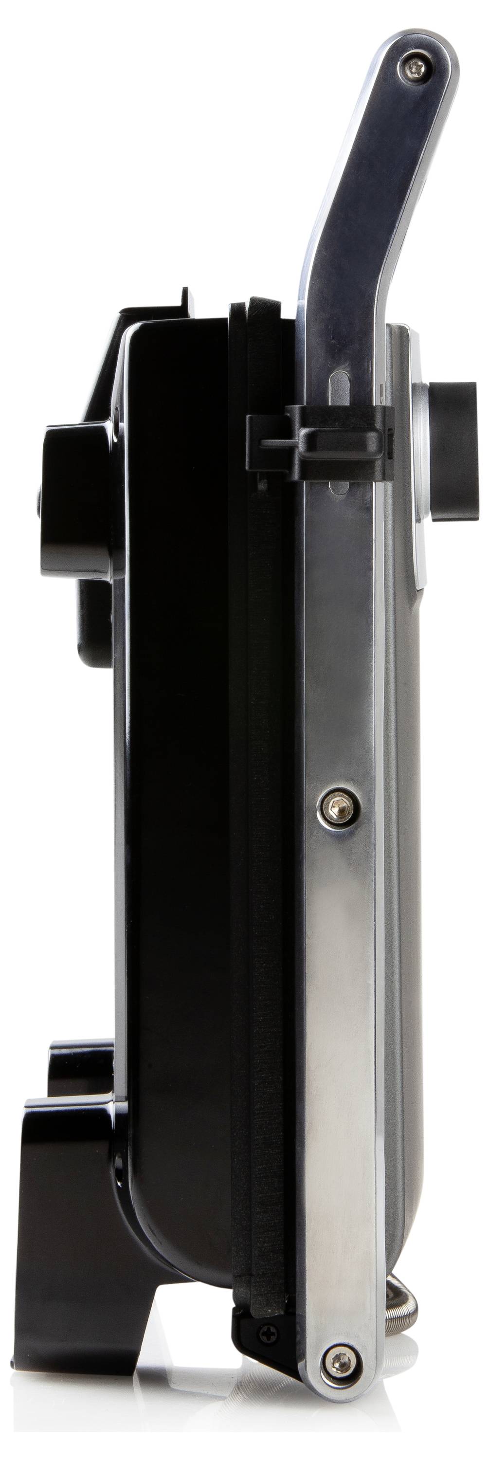 Gaufrier en vue latérale avec une poignée métallique et un boîtier noir. L'appareil est posé sur une surface blanche.