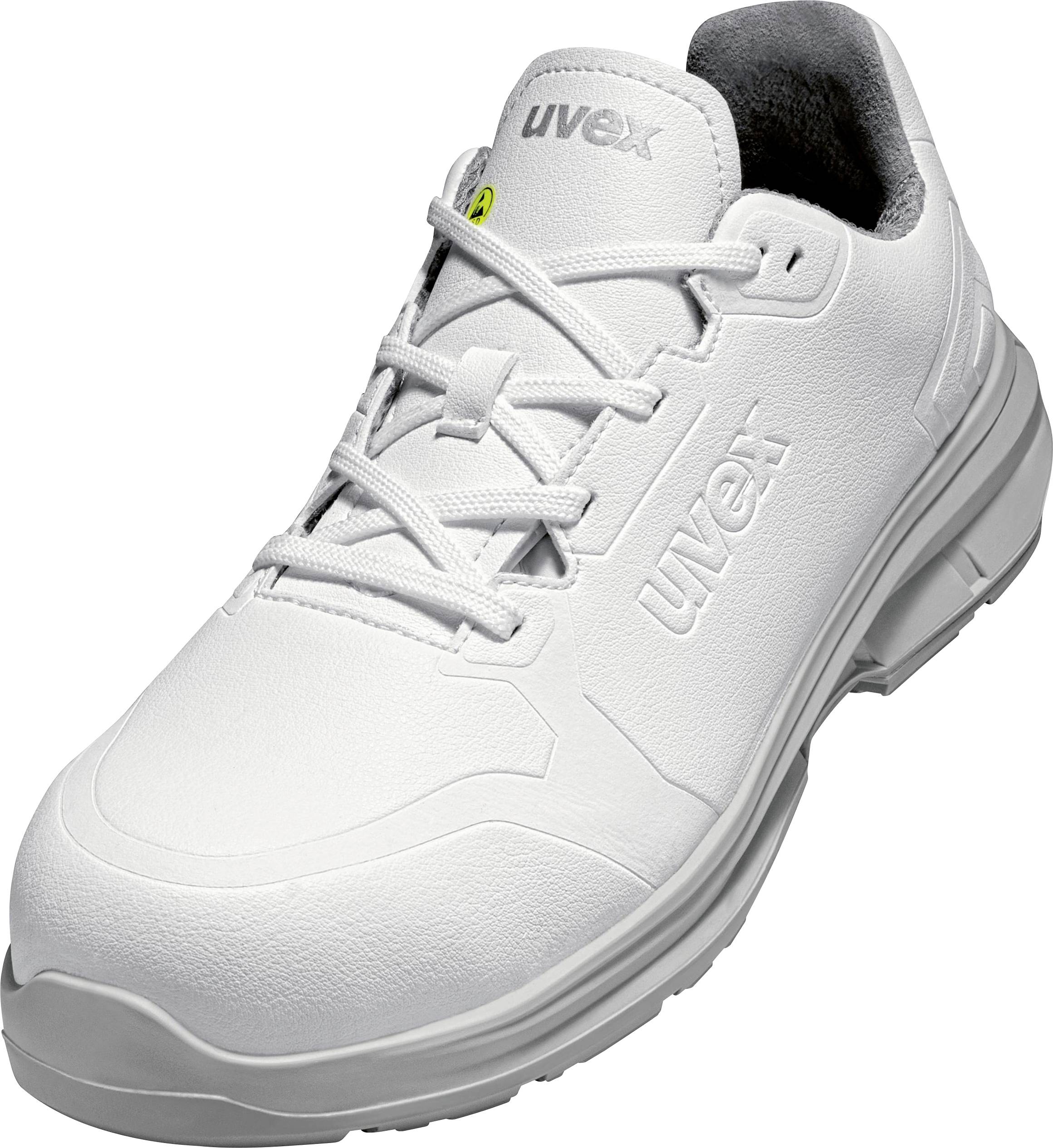 Chaussure de sécurité blanche de la marque Uvex avec laçage, adaptée à une utilisation dans différents environnements de travail.
