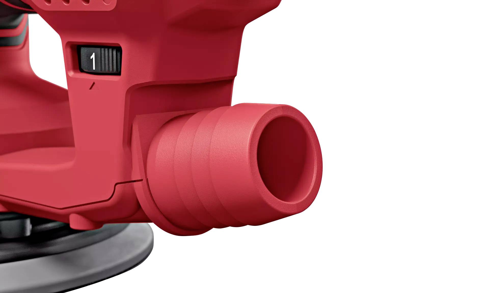 Gros plan d'un outil électrique rouge doté d'une sortie d'aspiration de poussière, reconnaissable à sa buse nervurée.