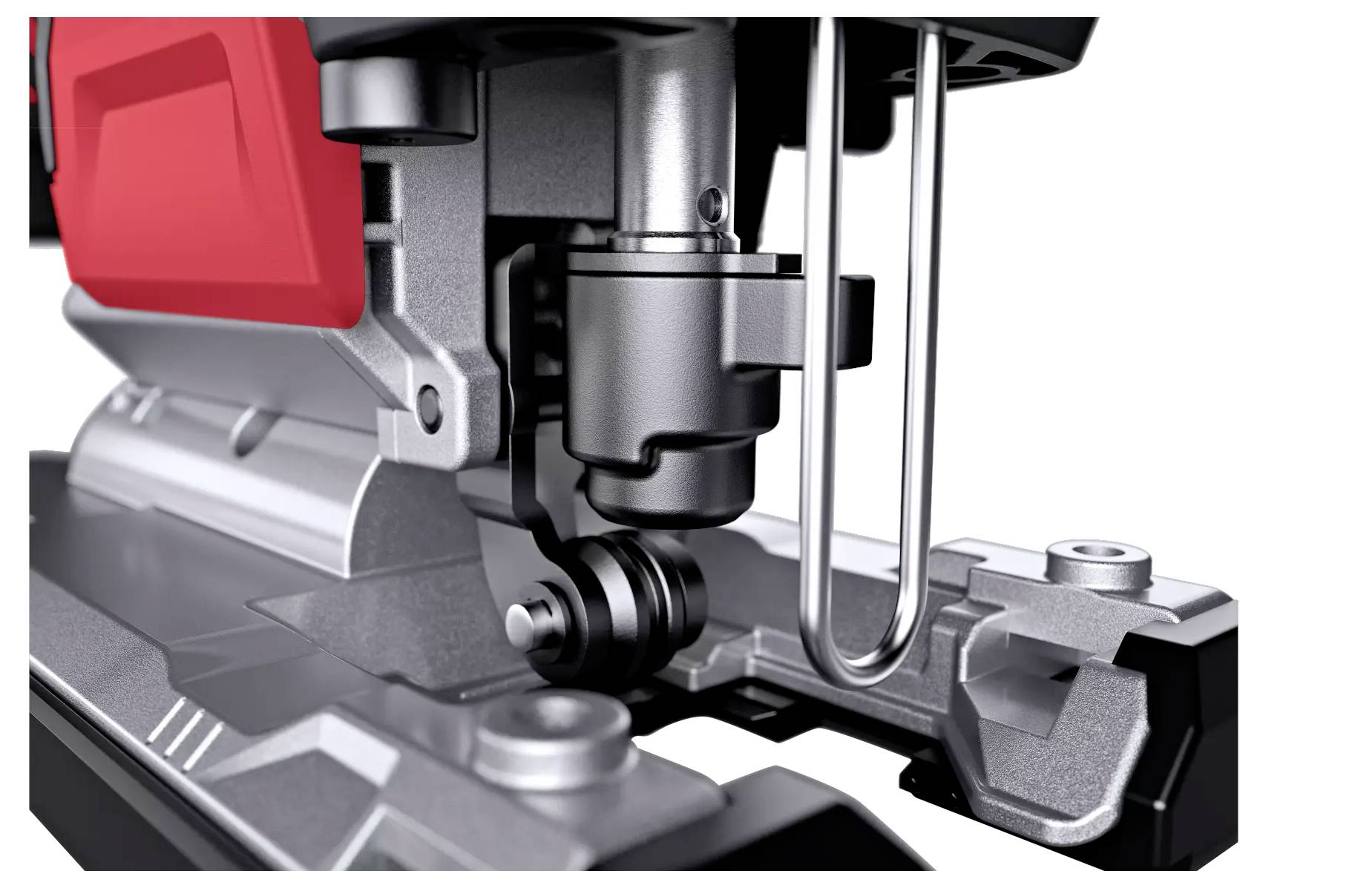 Gros plan sur une scie sauteuse électrique à boîtier rouge, mettant en valeur la partie inférieure de la lame et soulignant sa mécanique précise.