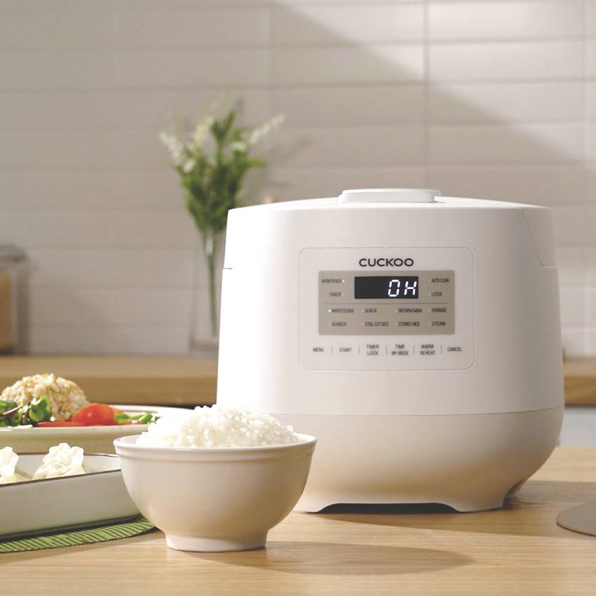 Cuckoo CR-0641F Cuiseur à riz blanc revêtement anti-adhésif, avec verre doseur, fonction cuiseur de riz