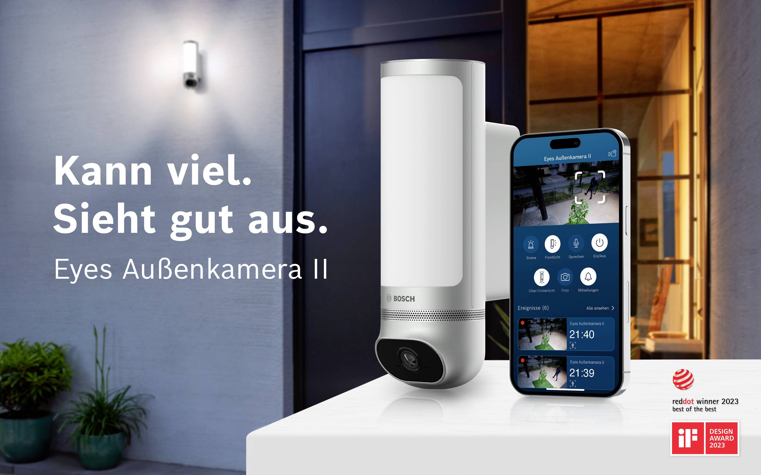 Caméra de sécurité blanche de Bosch à côté d'un smartphone affichant des vidéos de surveillance en direct. Texte : 'Fait beaucoup. A belle allure. Eyes Caméra extérieure II'.