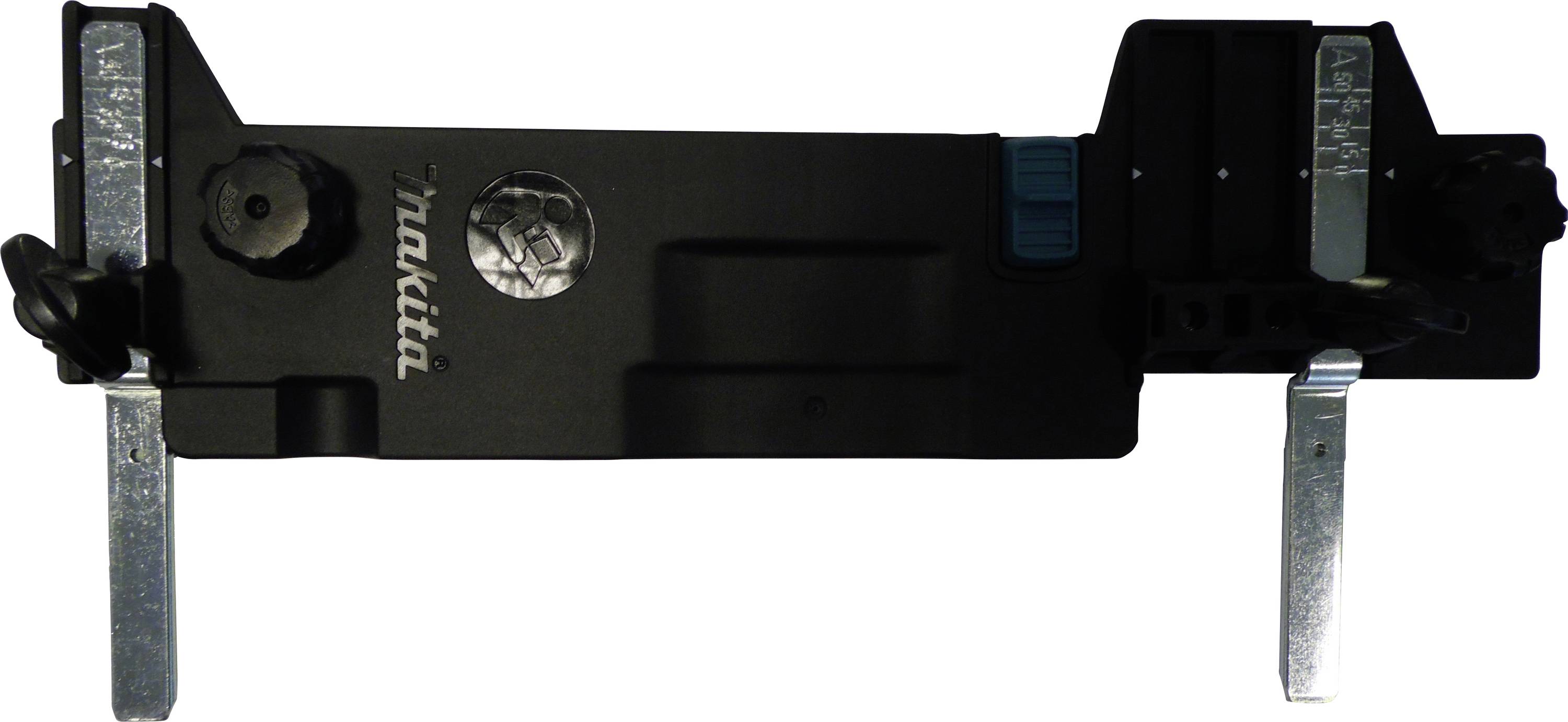 Un outil noir et rectangulaire avec deux supports métalliques. Le nom de marque 'Makita' est visible. Probablement une partie d'un équipement plus grand.