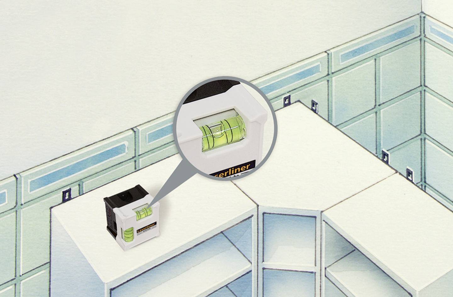 Niveau à bulle sur un meuble de cuisine pour un alignement correct. Un gros plan met en évidence le bulbe vert en focus.