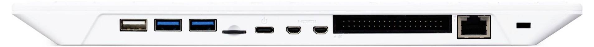 Arrière d'un appareil électronique avec différentes connexions : USB, HDMI, Ethernet et autres, disposées en ligne.