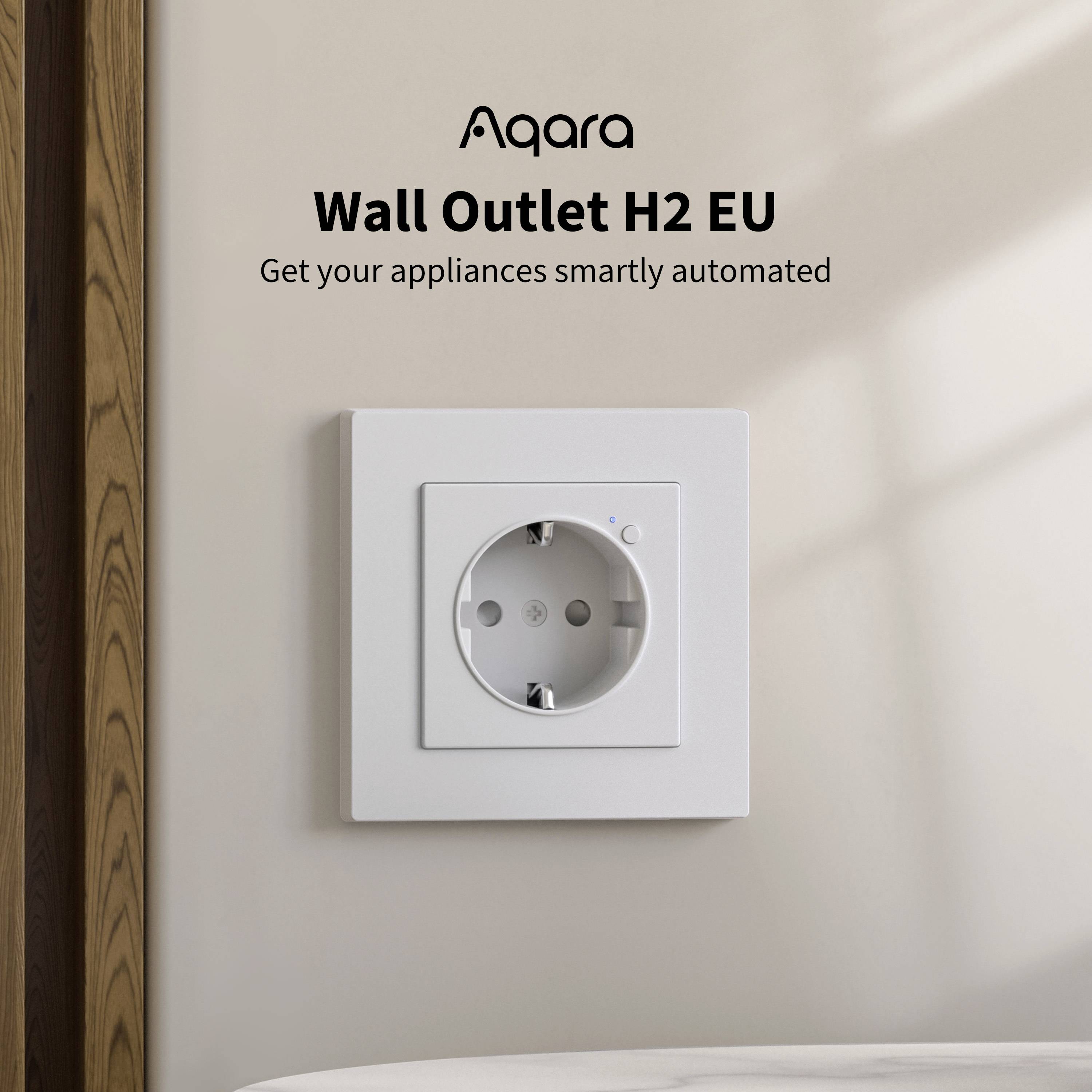 Prise électrique blanche sur un mur portant l'inscription 'Aqara Wall Outlet H2 EU'. Texte : 'Automatisez intelligemment vos appareils'.