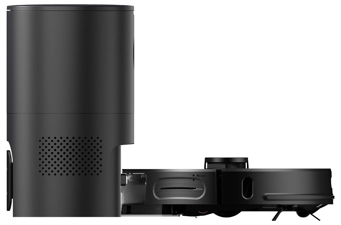 Un robot aspirateur noir avec station de charge, vu de côté. Le robot dispose d'un capteur rond sur le dessus.