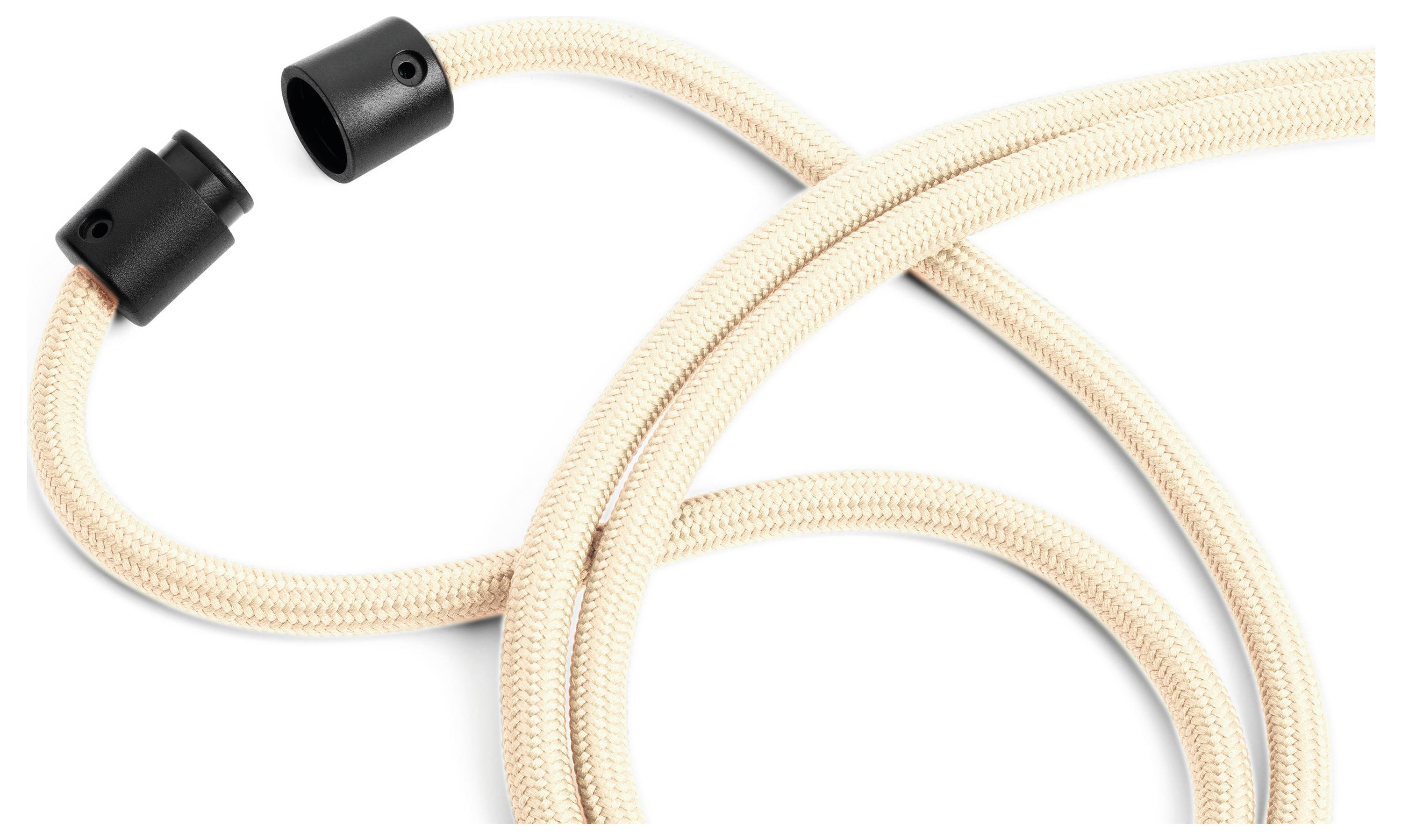 Tuyau flexible, tressé de couleur beige avec des extrémités noires, courbé dans une forme ondulante.