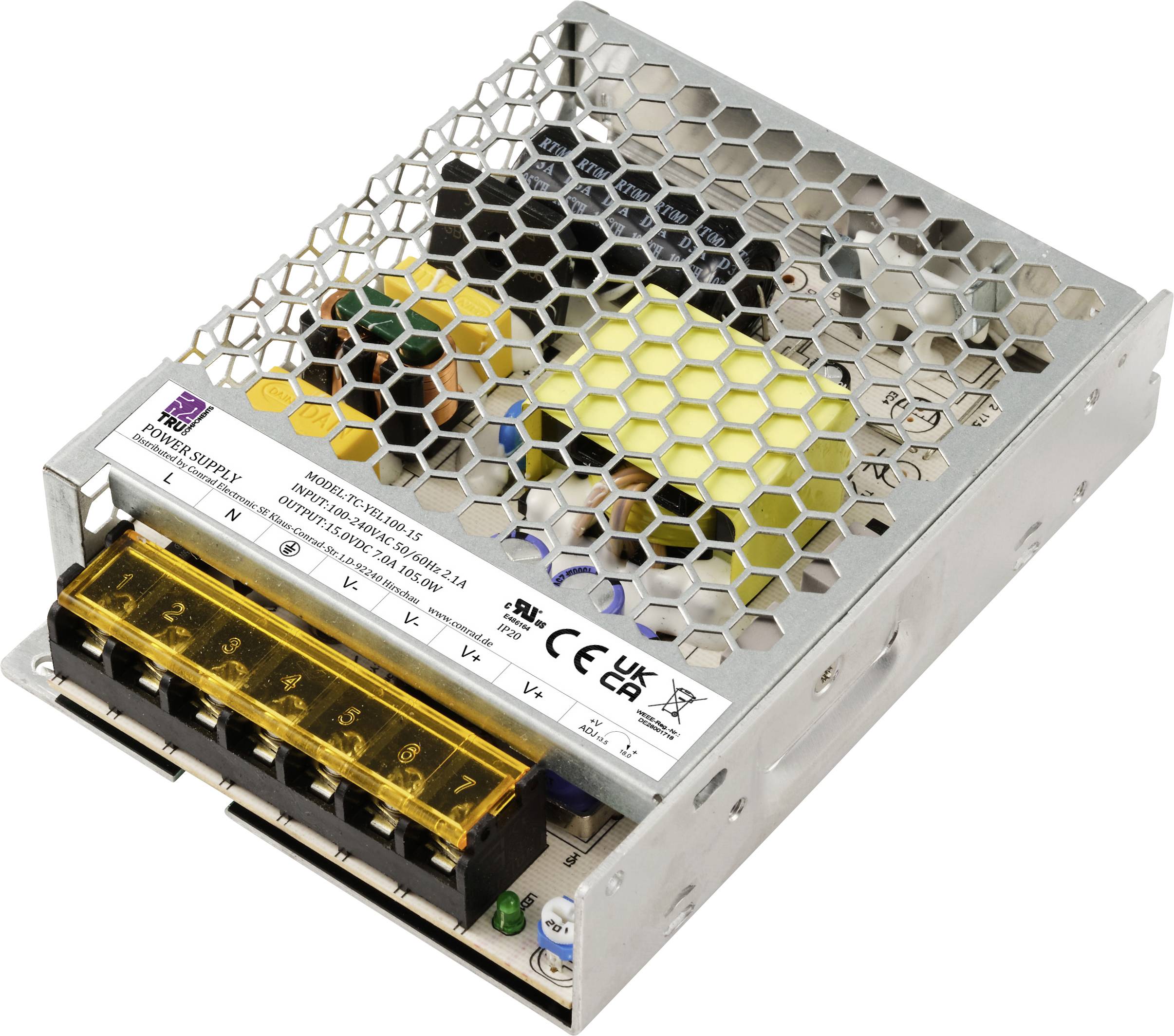 Bloc d'alimentation métallique avec couvercle alvéolaire, plusieurs connexions et fentes de ventilation. Adapté pour les appareils électroniques ou les systèmes.