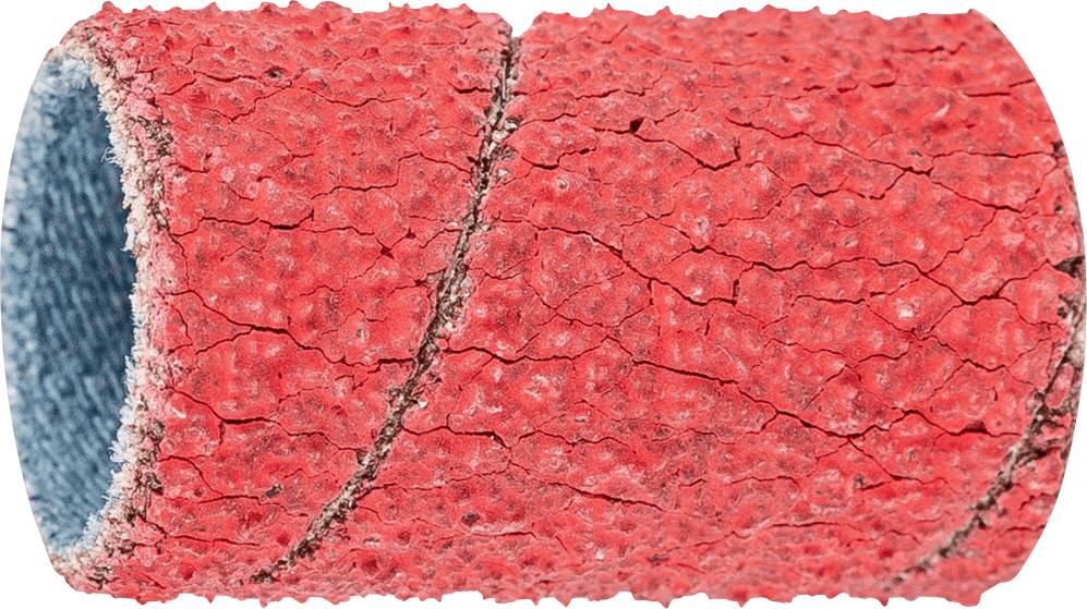Un rouleau de mousse rouge en forme de spirale, avec une texture rugueuse, pouvant être utilisé comme matériau isolant ou d'amortissement.