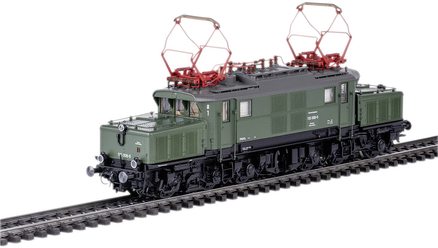 Modèle vert d'une locomotive électrique sur des rails, avec des pantographes visibles en haut.