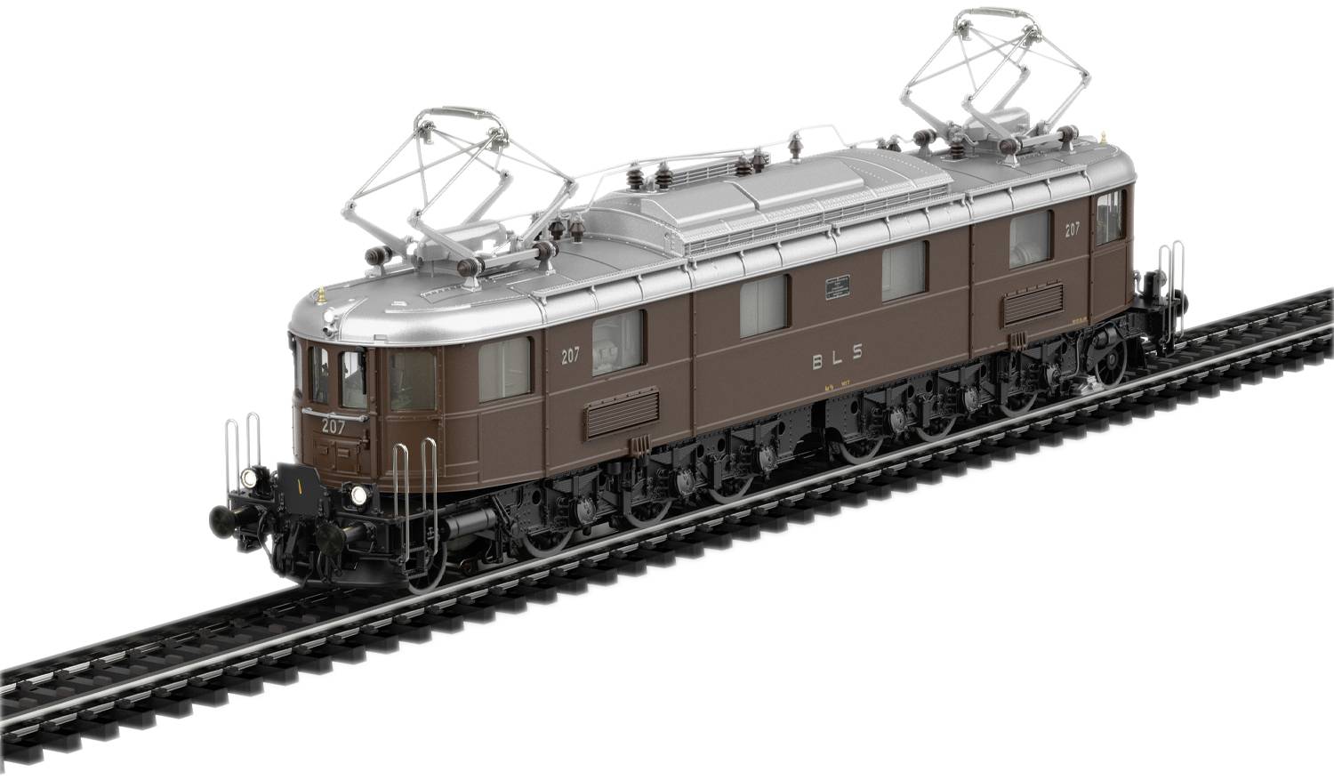 Un train miniature de la marque LGB, une locomotive électrique des BLS, peinte en brun, avec des pantographes sur les rails.
