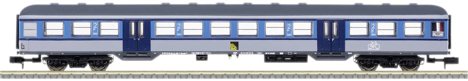 Un wagon bleu-gris sur une voie ferrée, avec plusieurs fenêtres et un emblème français sur le côté.