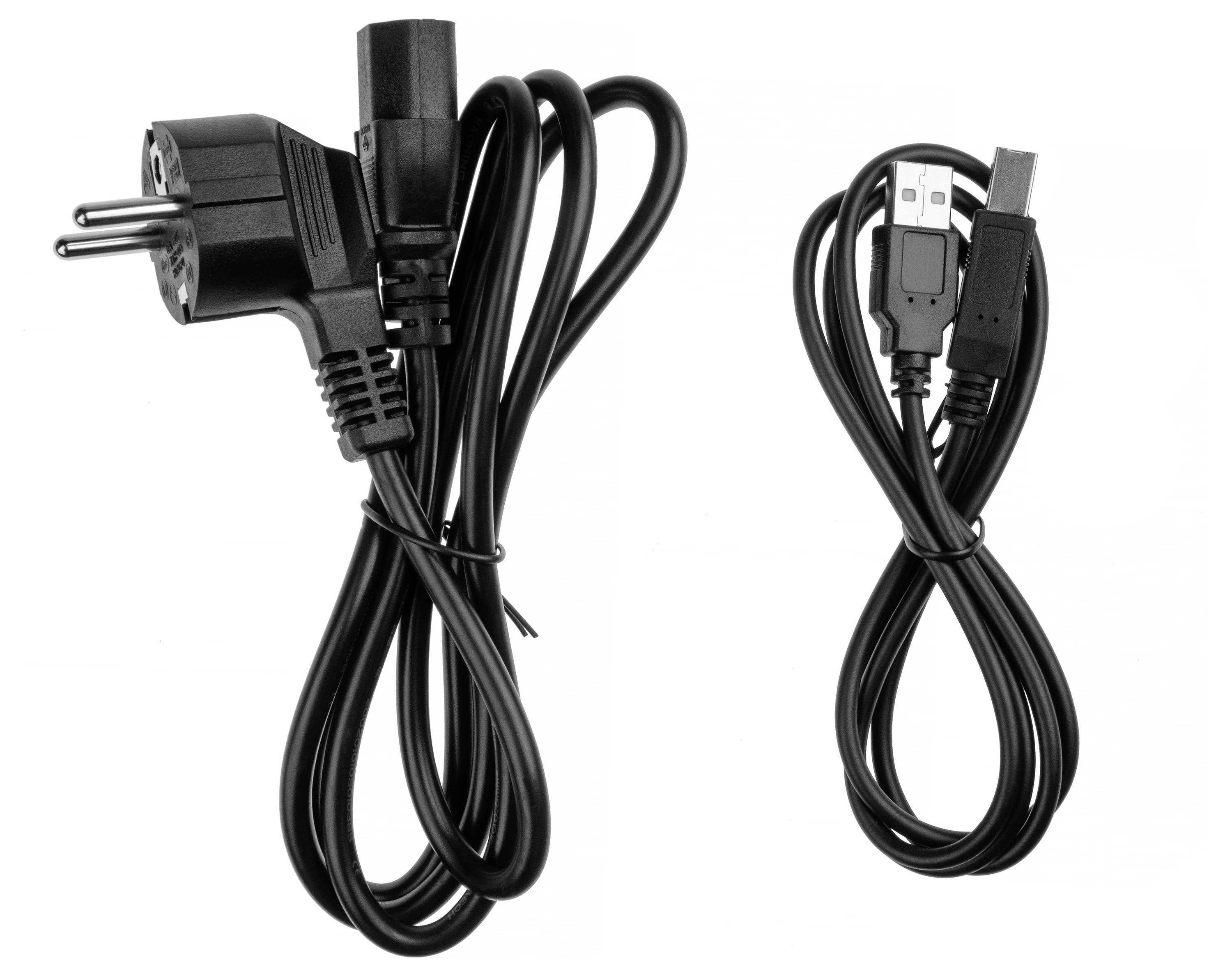 Deux câbles noirs : à gauche un câble d'alimentation avec une fiche Schuko, à droite un câble USB avec des fiches USB-A et USB-B.