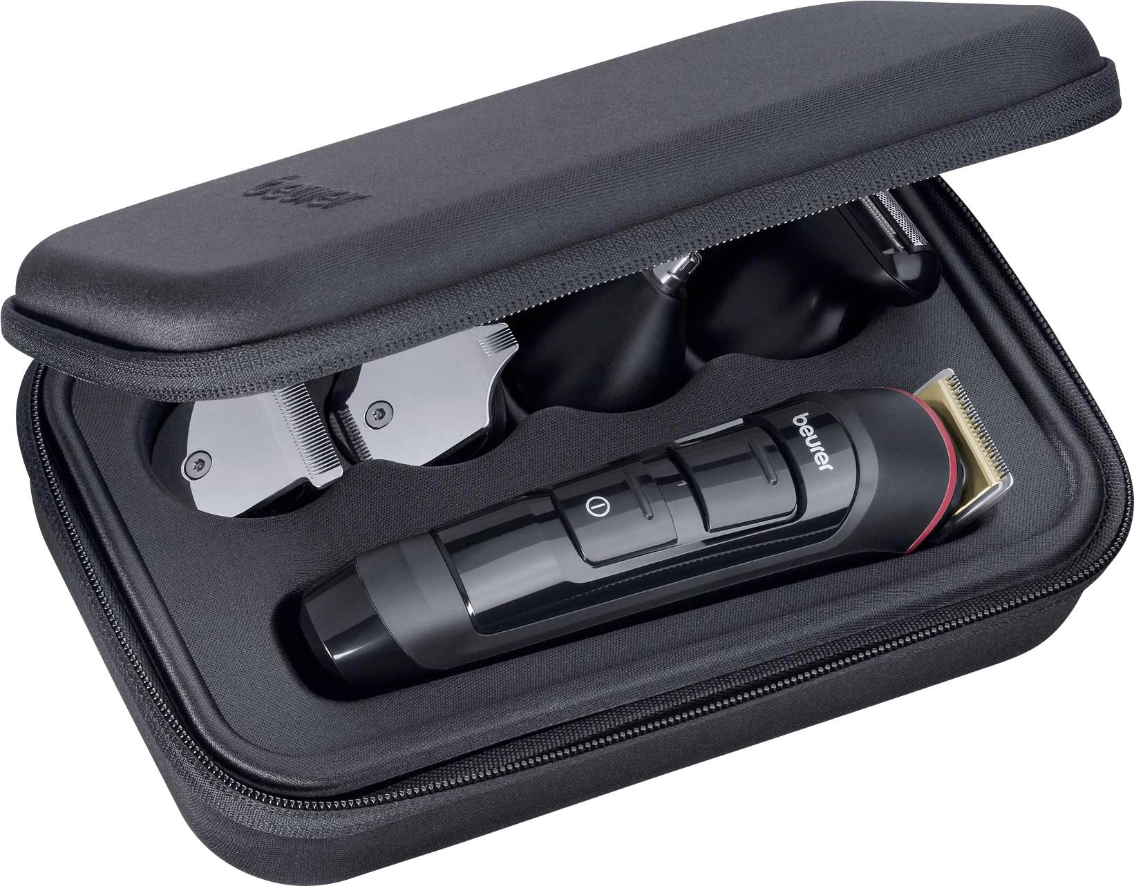 Tondeuse électrique dans un sac de voyage ouvert avec plusieurs accessoires, prête à être utilisée ou emportée en voyage.