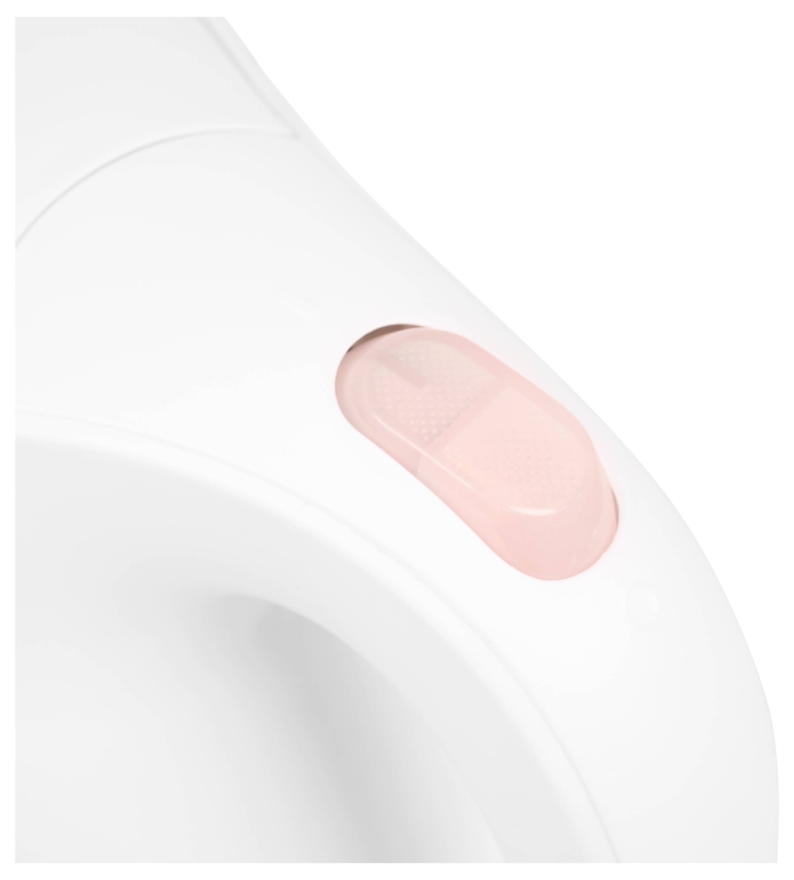 Gros plan d'un appareil blanc avec un interrupteur rose.