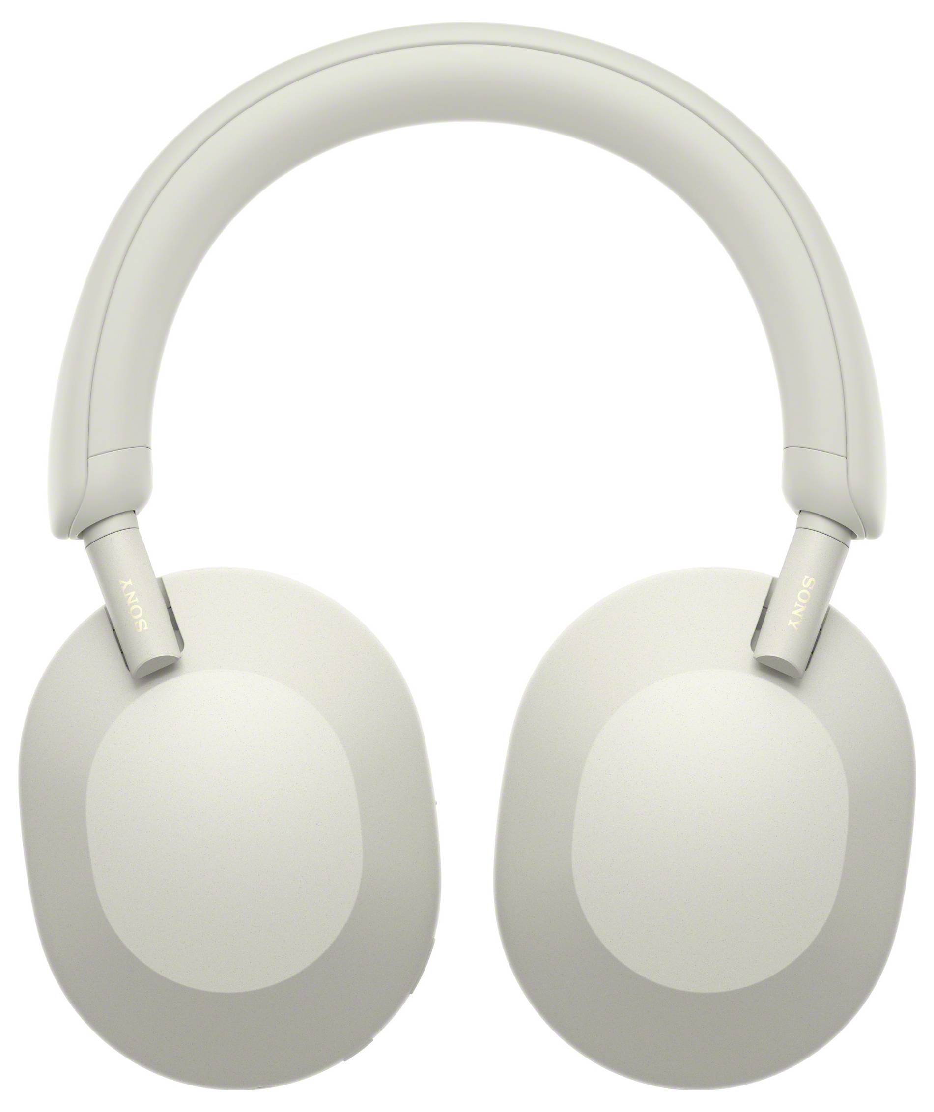 Écouteurs sans fil gris avec des coques auriculaires ovales et un arceau rembourré. Design moderne dépourvu de commandes visibles.