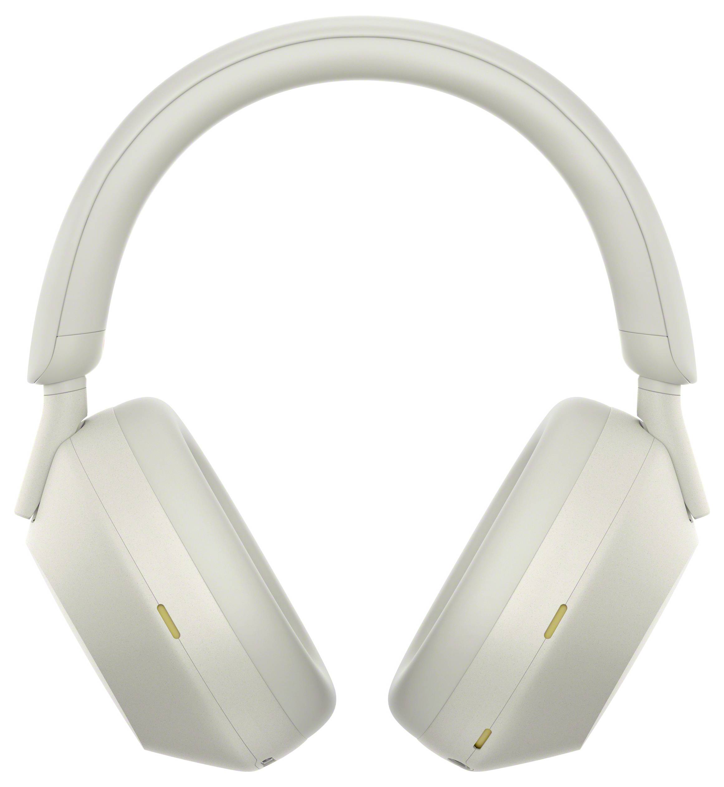 Une paire d'écouteurs circum-auriculaires blancs au design moderne, présentés sur un fond blanc, avec un focus sur les coussins d'oreille et l'arceau.