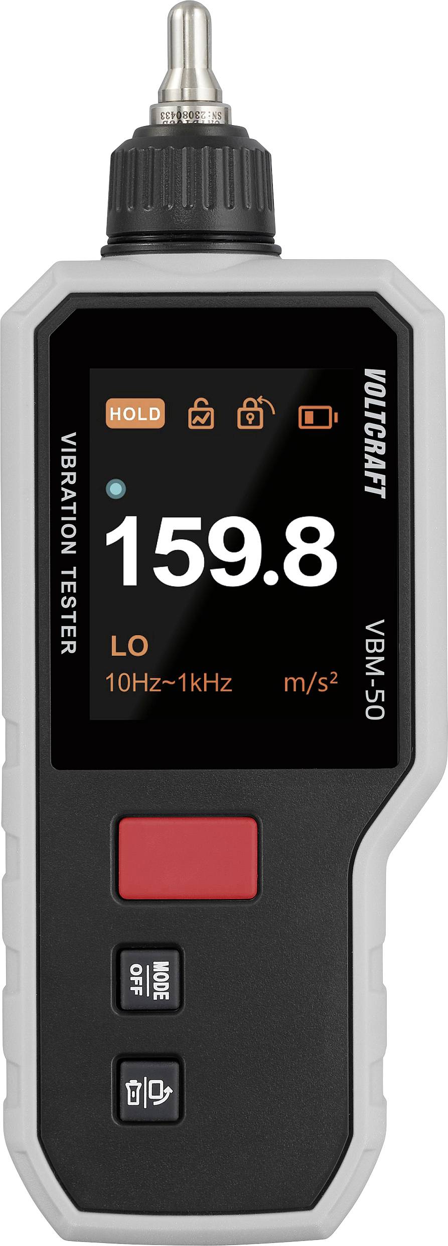 Testeur de vibrations numérique affichant une mesure de '159,8'. L'écran présente les paramètres : plage de 10 Hz–1 kHz, unité m/s², fonction 'HOLD' activée.