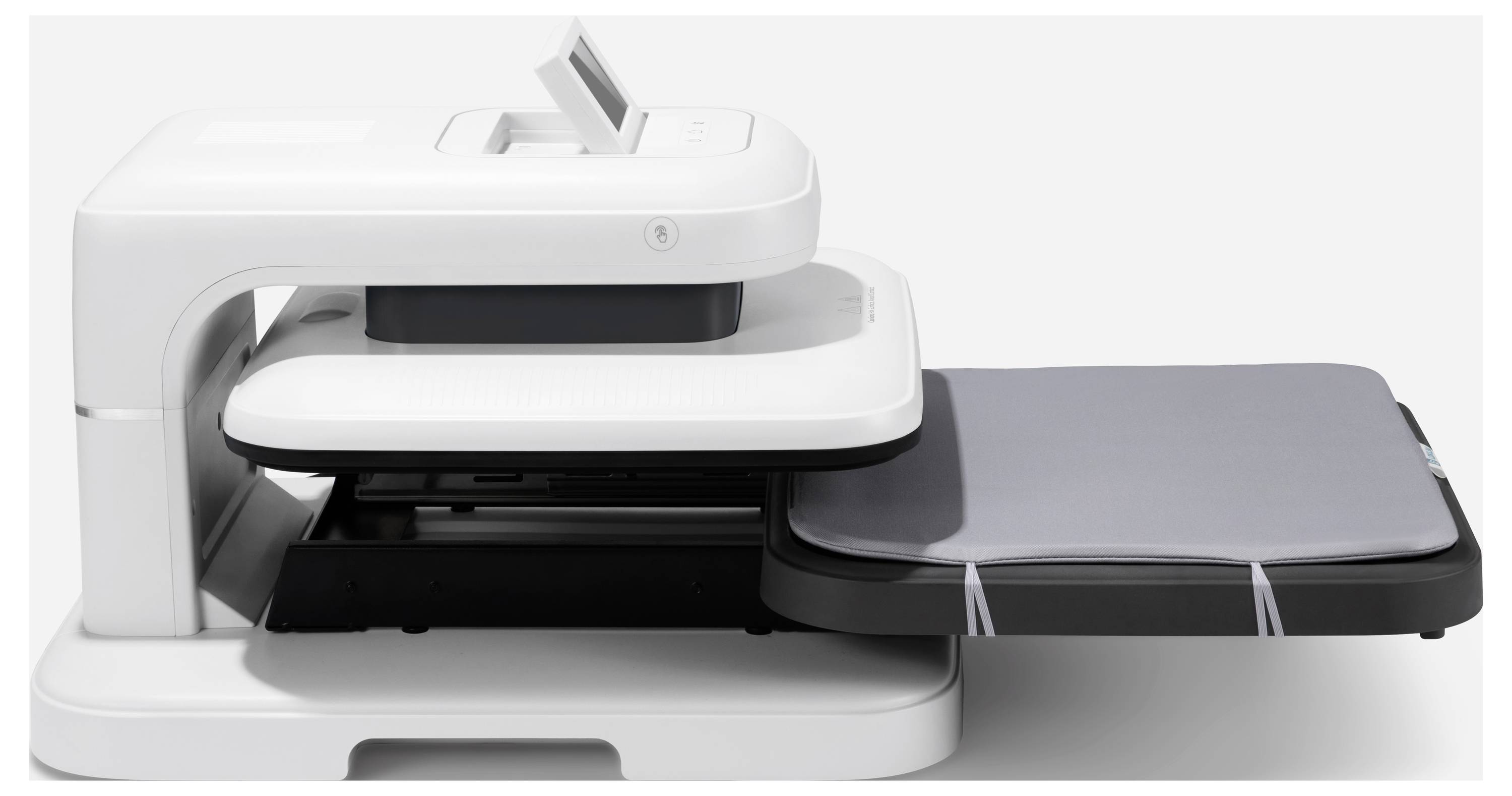 Un appareil blanc et moderne avec une surface grise de rangement, probablement un scanner ou une imprimante, devant un arrière-plan uni.