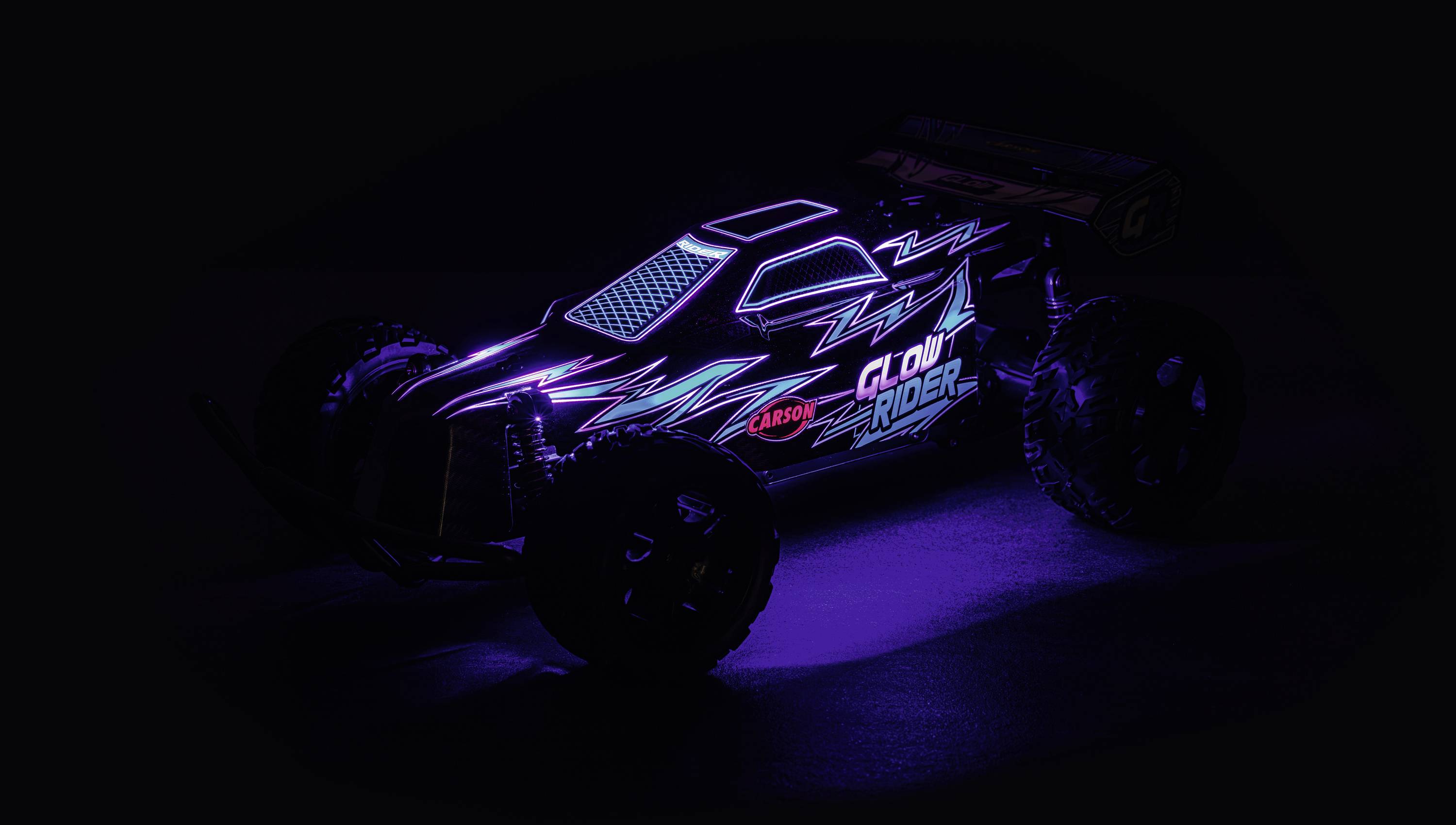 Carson Modellsport Glow Rider bleu 1:12 Auto RC électrique Buggy 100% RtR 2,4 GHz avec accu, chargeur et piles pour l'émetteur
