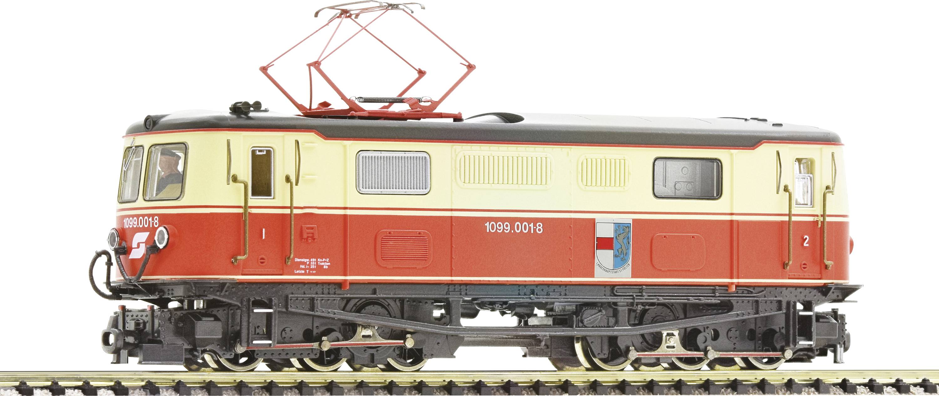 Une locomotive électrique modèle rouge et crème est posée sur une voie. Elle est conçue dans le style d'une locomotive autrichienne.