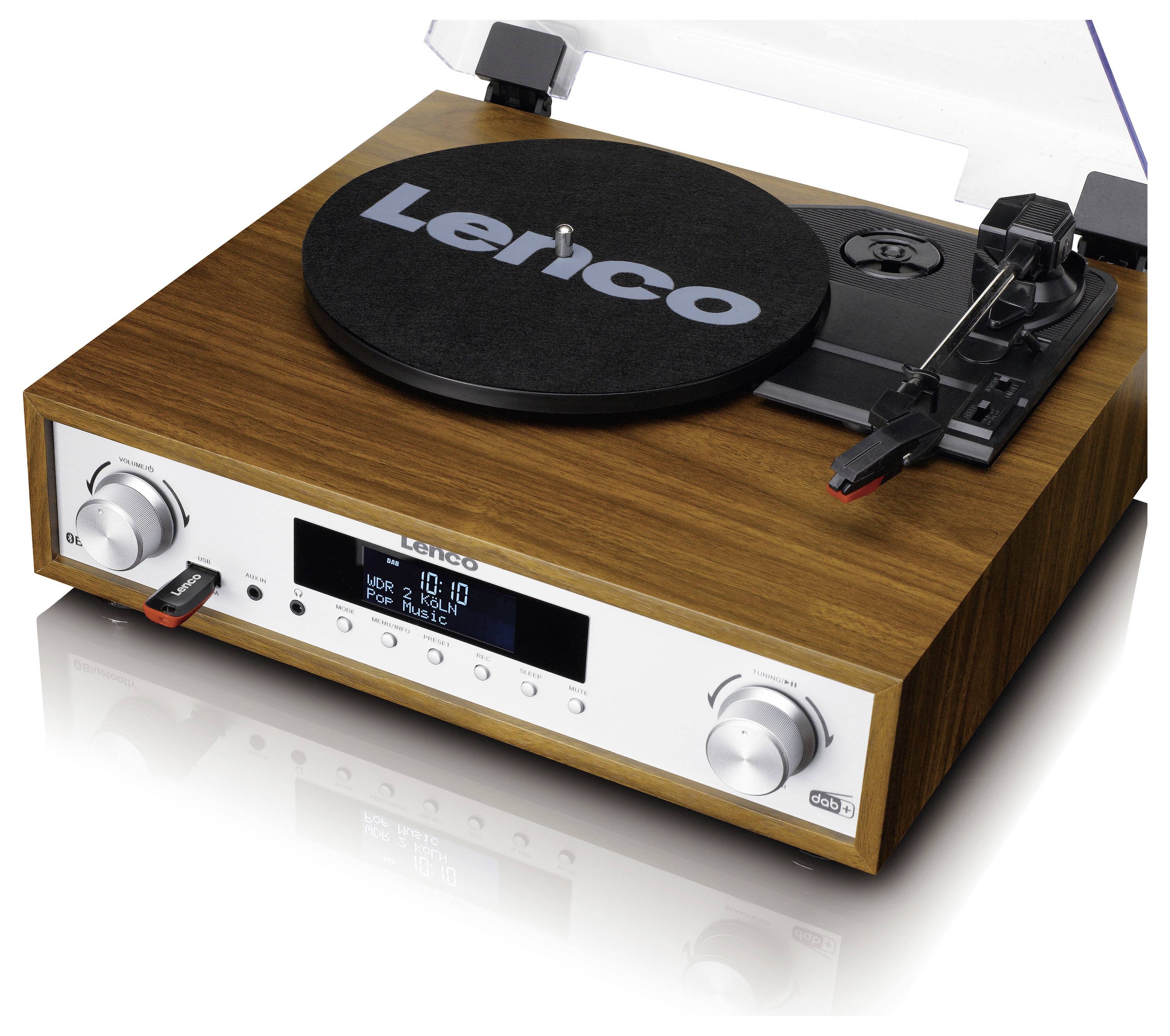 Un tourne-disque moderne avec un boîtier en bois, un couvercle ouvert et une radio intégrée. Marque 'Lenco' sur le tapis de platine.