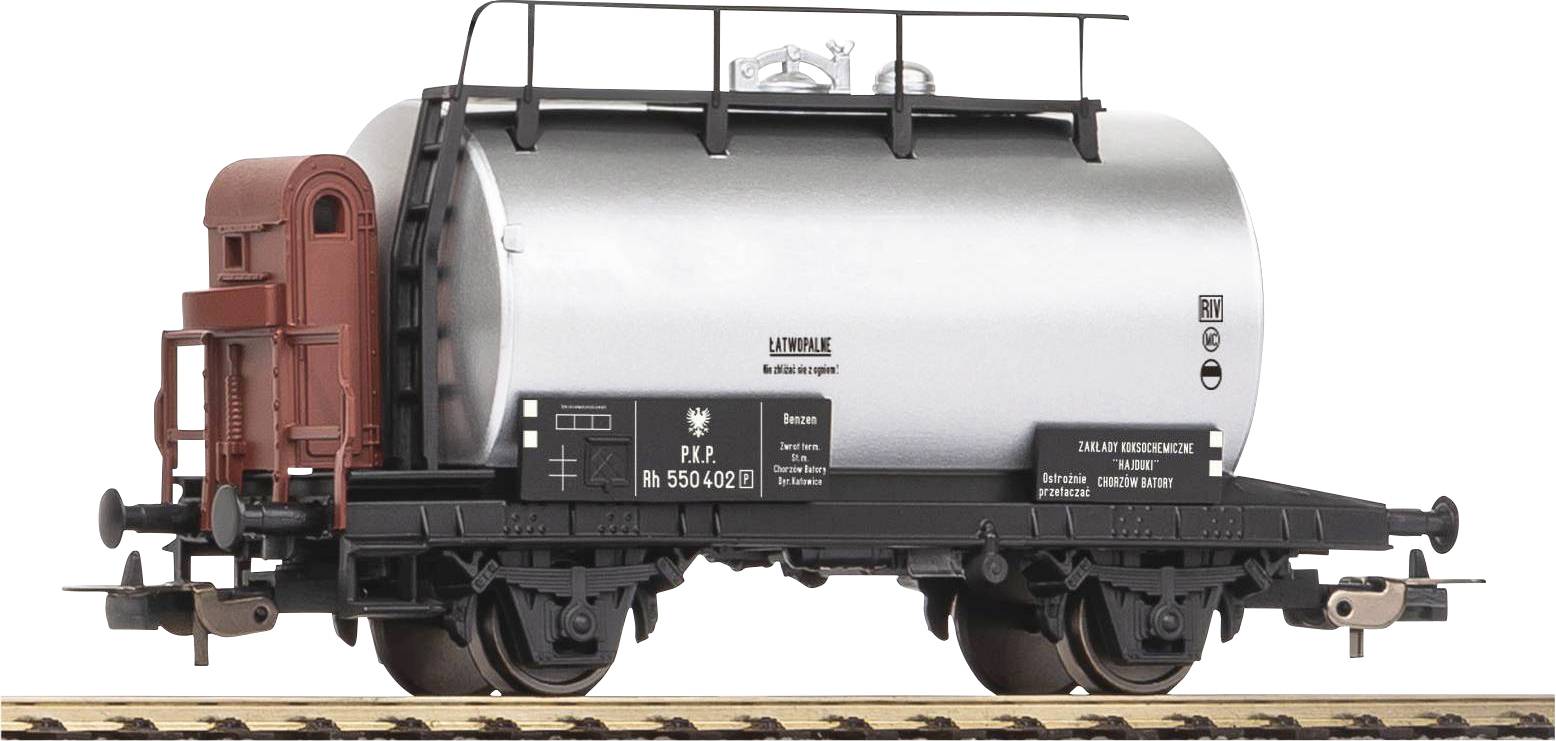 Un wagon d'argent avec un grand réservoir, posé sur des rails. Le wagon présente des détails noirs et porte l'inscription 'Latérale'.