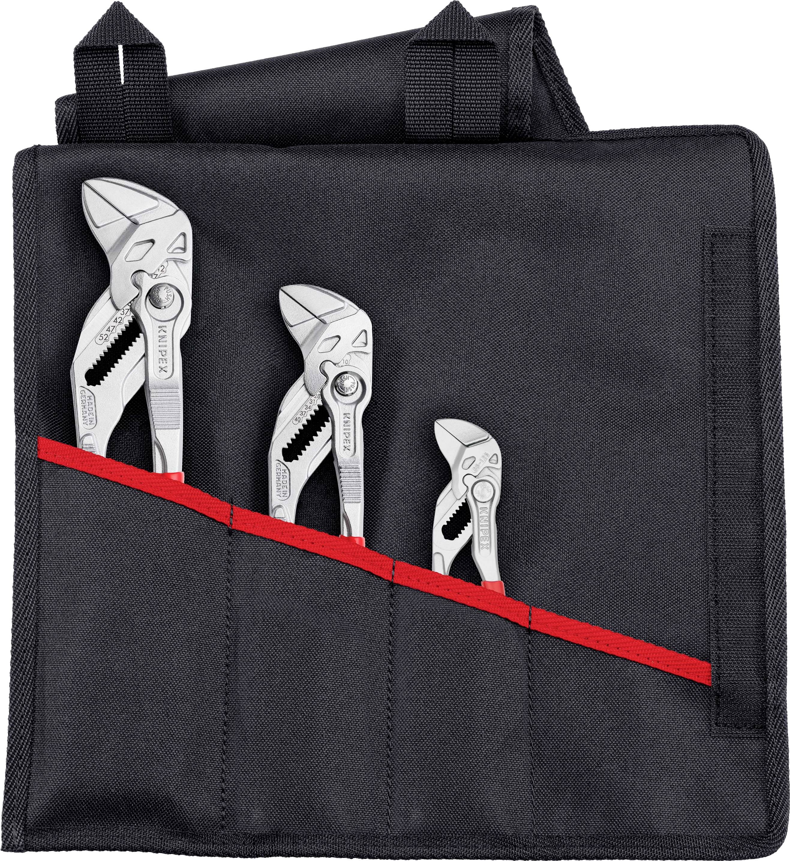 Trois clés à tenailles en argent de différentes tailles dans un sac noir avec des compartiments rouges.