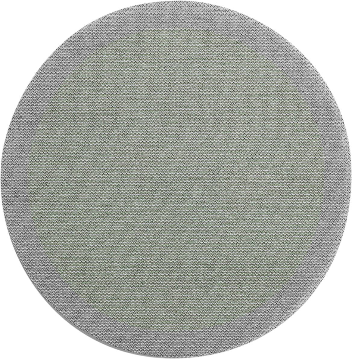 Tapis rond avec une bordure grise et un centre verdâtre. La texture est tissée.