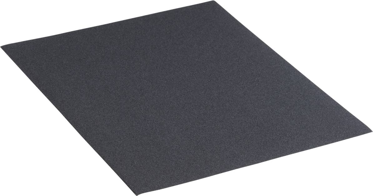Une feuille rectangulaire de papier de verre, noire, est posée à plat sur une surface.