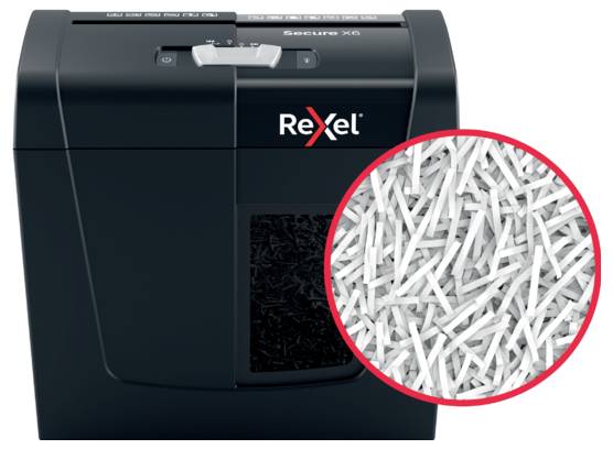 Destructeur de documents Rexel avec du papier déchiqueté au premier plan.