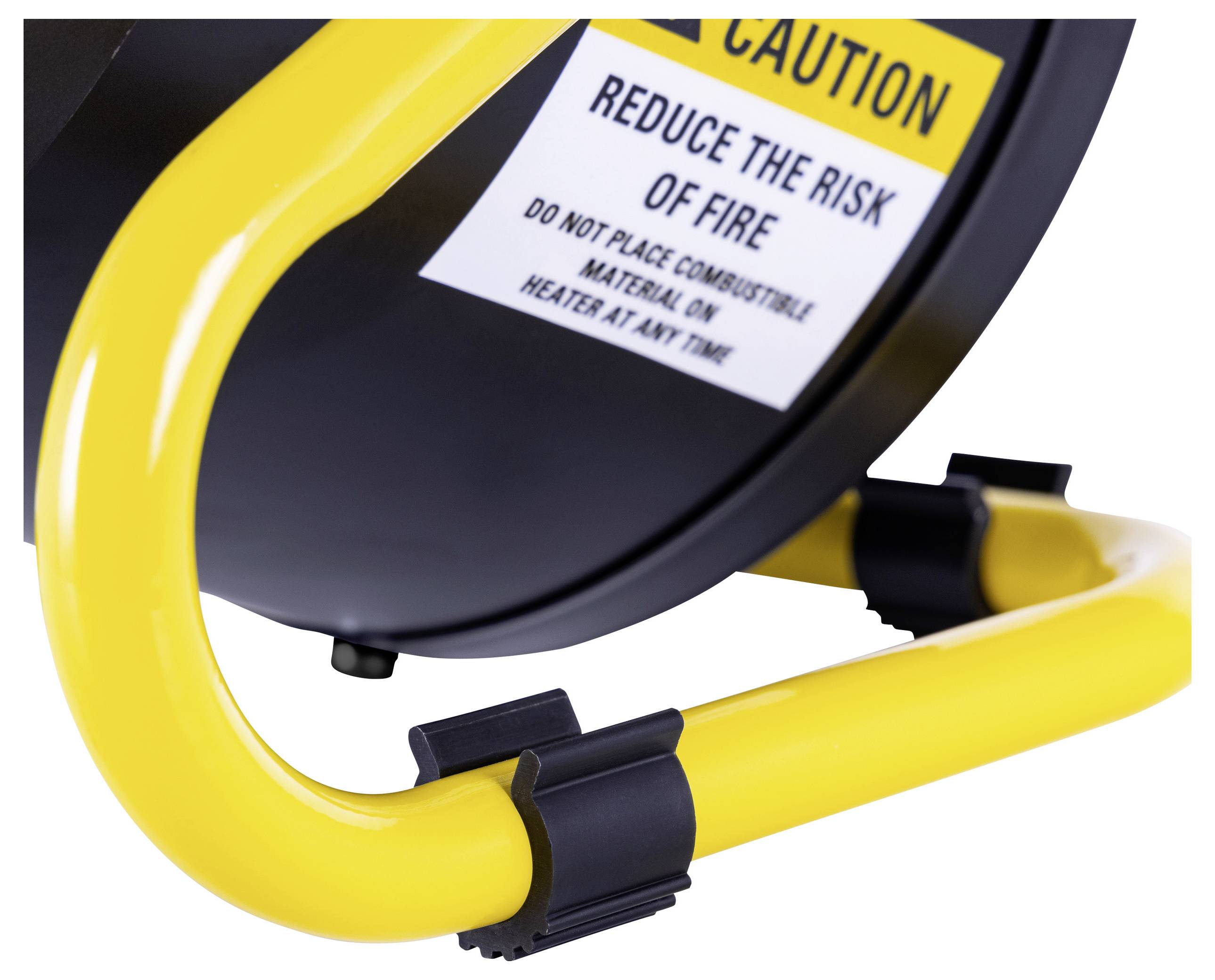 Un support jaune tenant un objet circulaire avec une étiquette de mise en garde. L'étiquette avertit contre le placement de matériaux combustibles sur le chauffage.