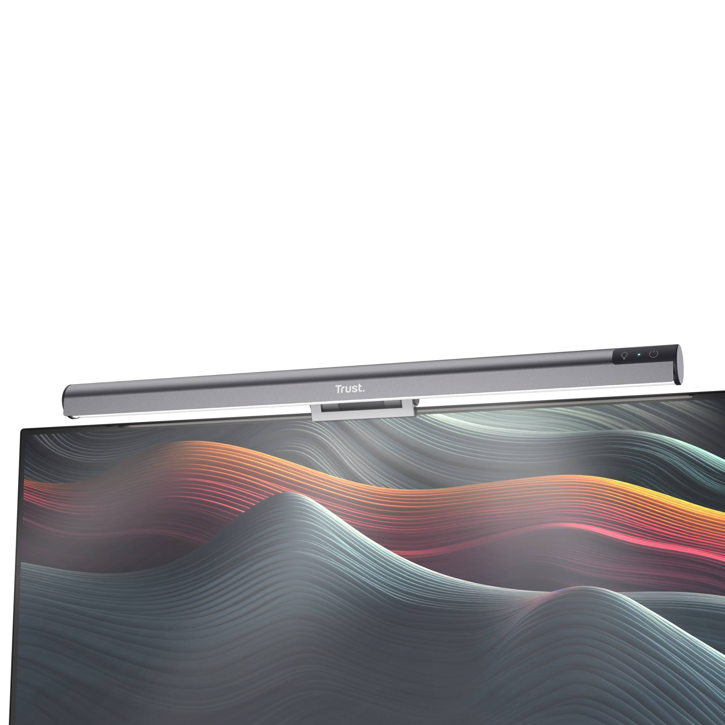 Lampe LED grise de Trust sur un moniteur, avec des vagues stylisées en rouge et bleu en arrière-plan de l'écran.