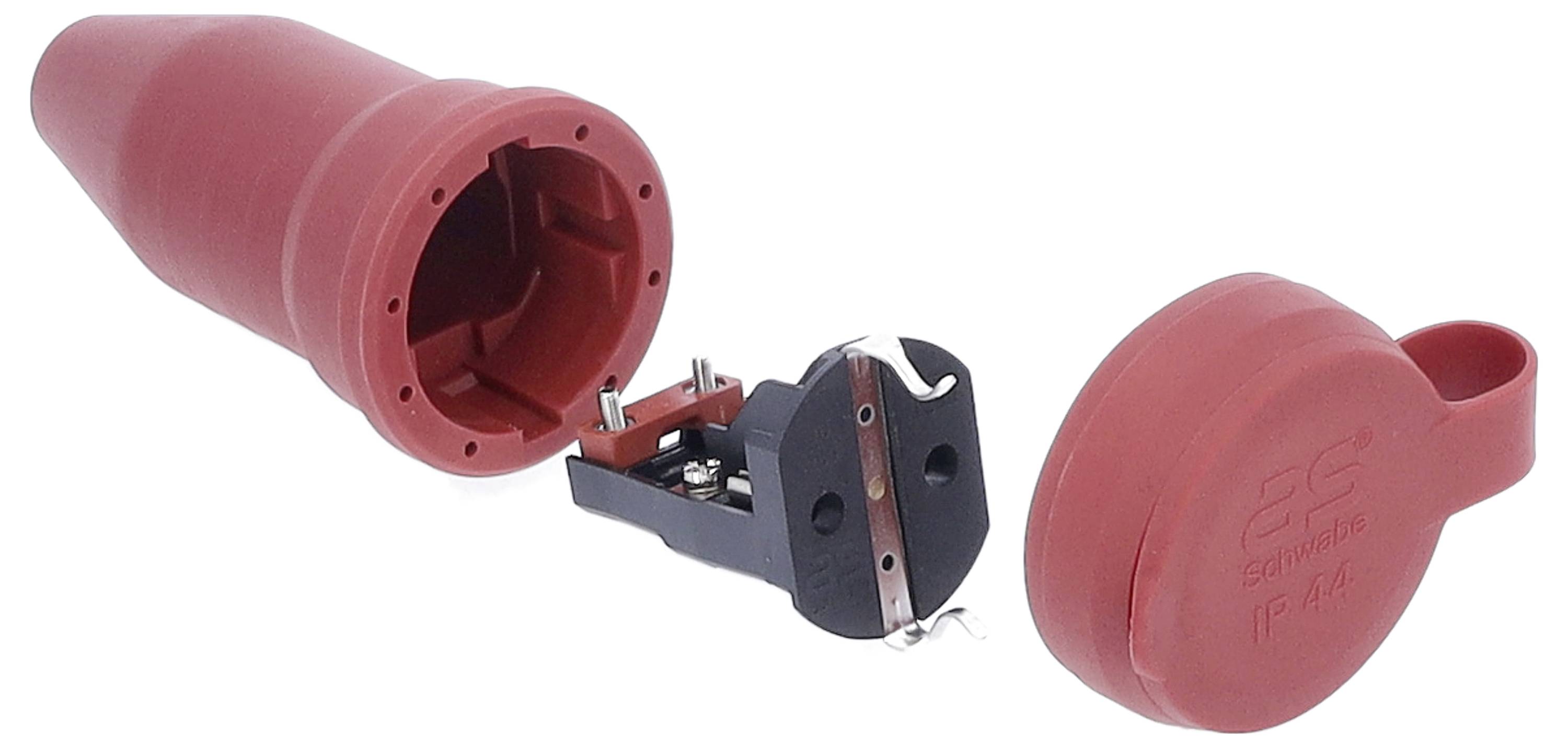 Un connecteur rouge cylindrique avec des pièces retirées. La composante centrale présente des contacts métalliques. Un couvercle est posé à côté.