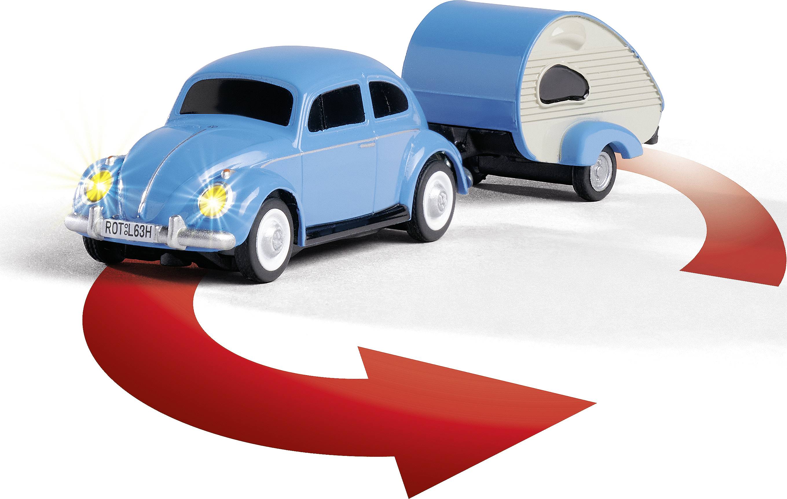 Une coccinelle de jouet bleue tire une petite caravane. Des flèches rouges illustrent un mouvement de rotation vers l'arrière.