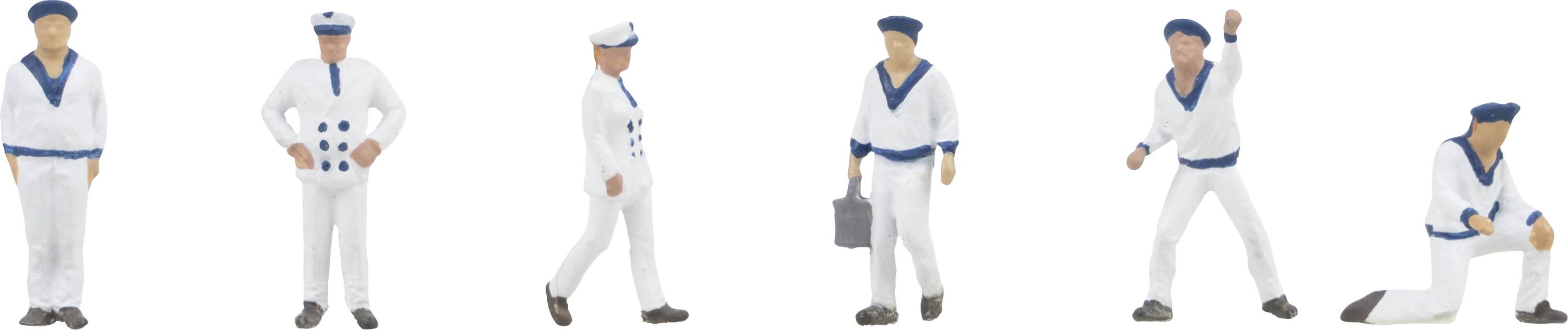 Six figurines miniatures de marins dans différentes poses, tous en uniforme blanc avec des détails bleus, chacun gesticulant de manière différente.