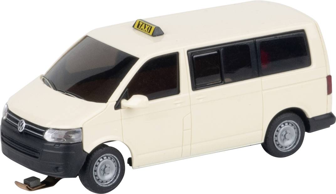 Une voiture miniature beige avec un panneau 'Taxi' sur le toit, ressemblant à un mini-fourgon. Elle possède des vitres noires et des roues argentées.